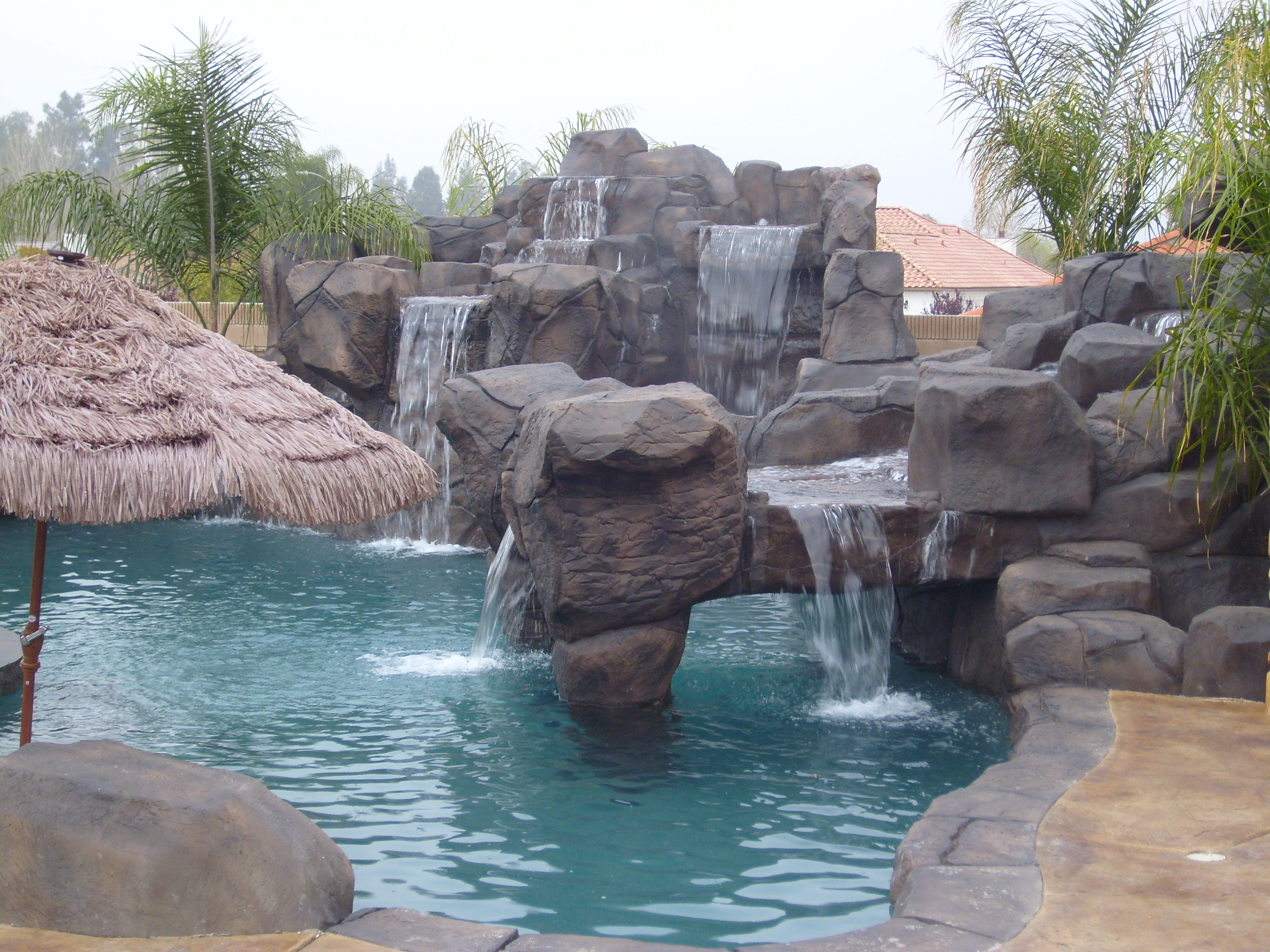 High End Custom Pool and Rock Waterfalls and Grotto